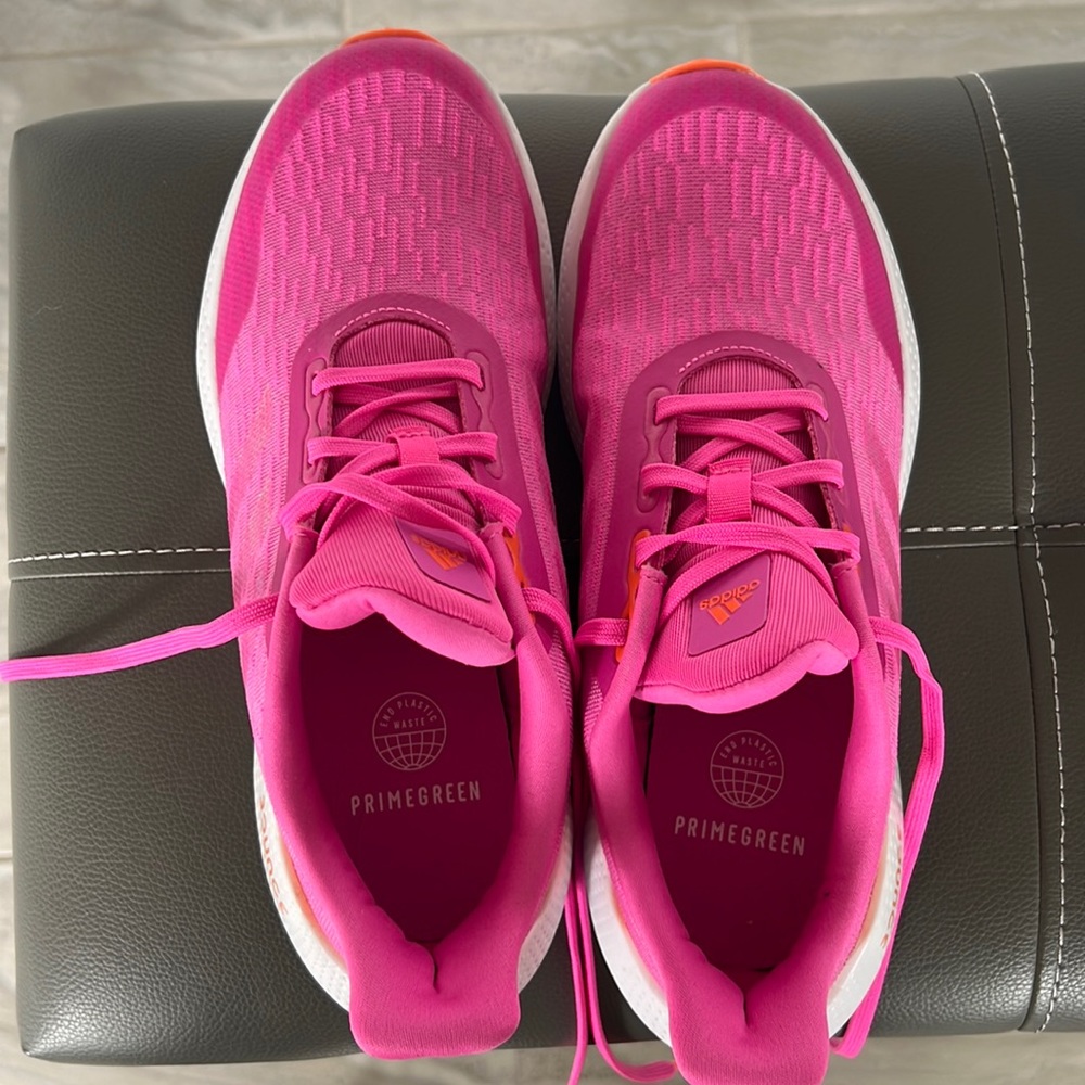 NWOB adidas Big girl size 7 tennis shoe.  Hot pink with orange.  Women’s 8.5